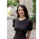 Photo of dark haired female professor
